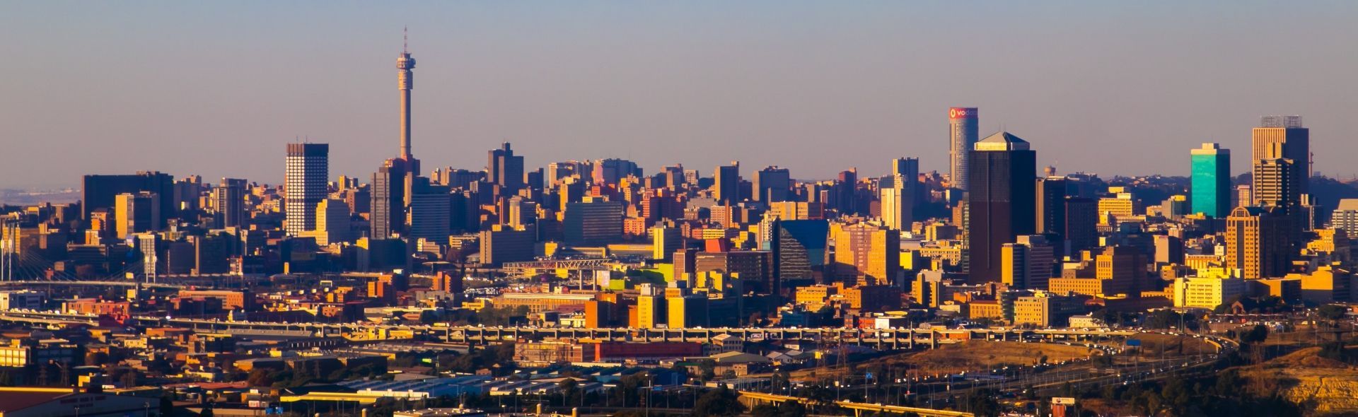 golden glow of the sun hitting the stunning city skyline