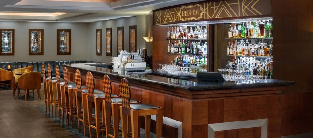 indoor bar that is fully stocked with alcohol