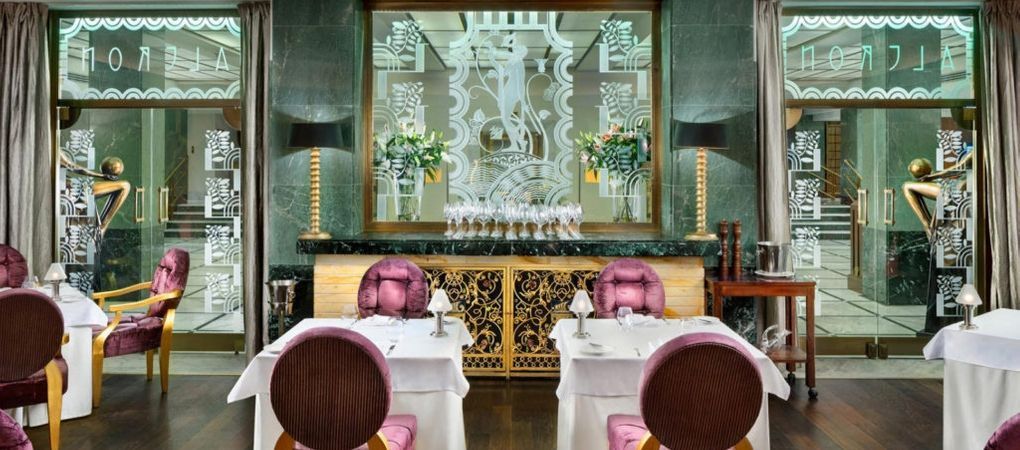 indoor dining room with purple chairs