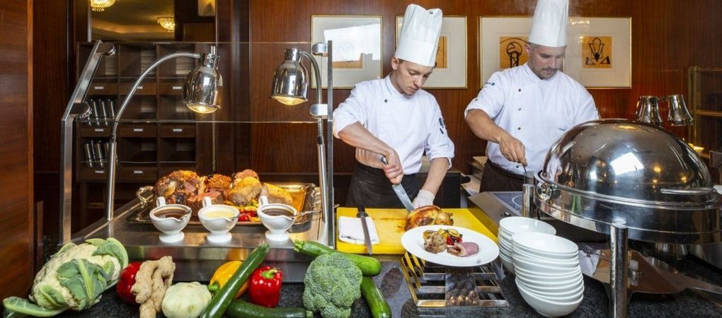 talented chefs preparing meals for the hotel guests