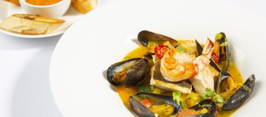 assortment of seafood with mussels, prawns and sea bass