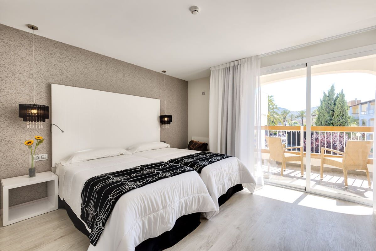 Bright and spacious hotel room. Contact Enable Holidays to book your accessible break at the Alcudia Garden Aparthotel