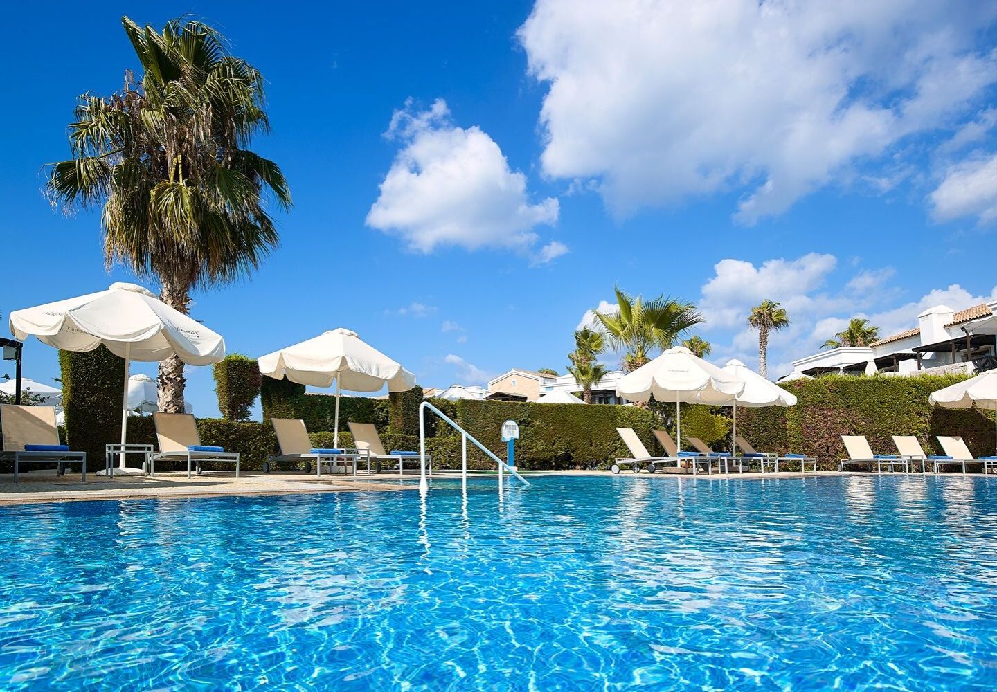 hotel exterior and outdoor swimming pool