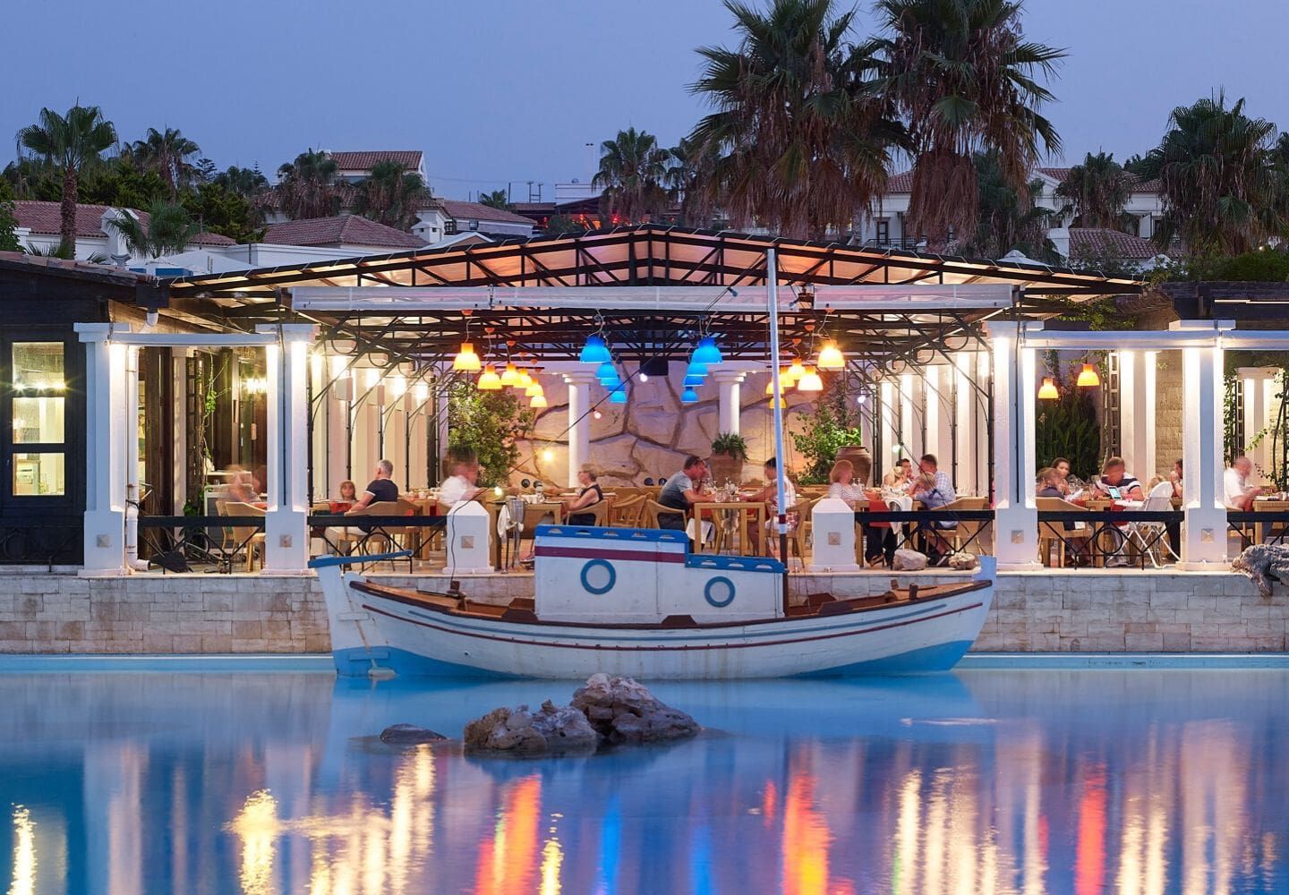 outdoor dining area overlooking the swimming pool