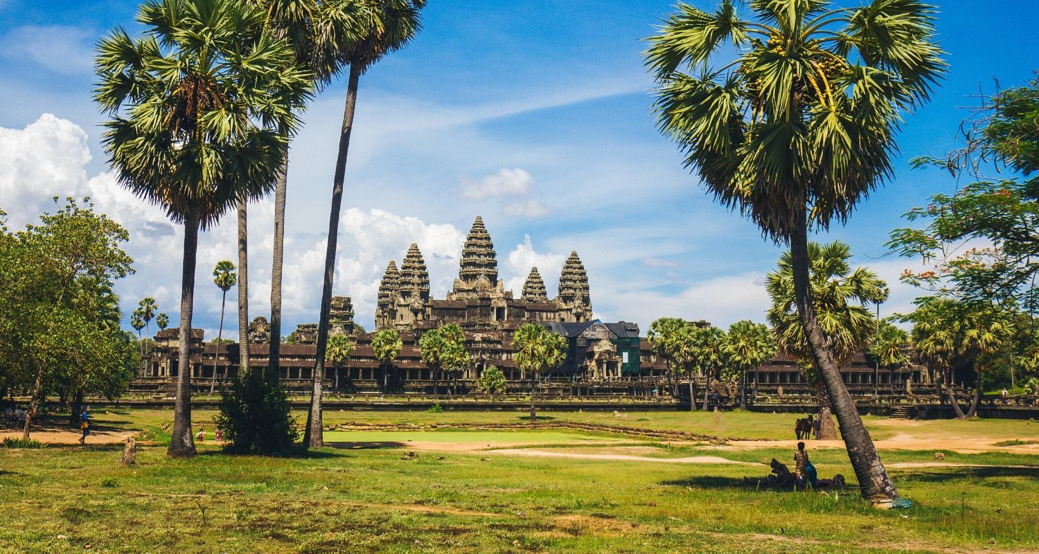 open field leading to ancient city