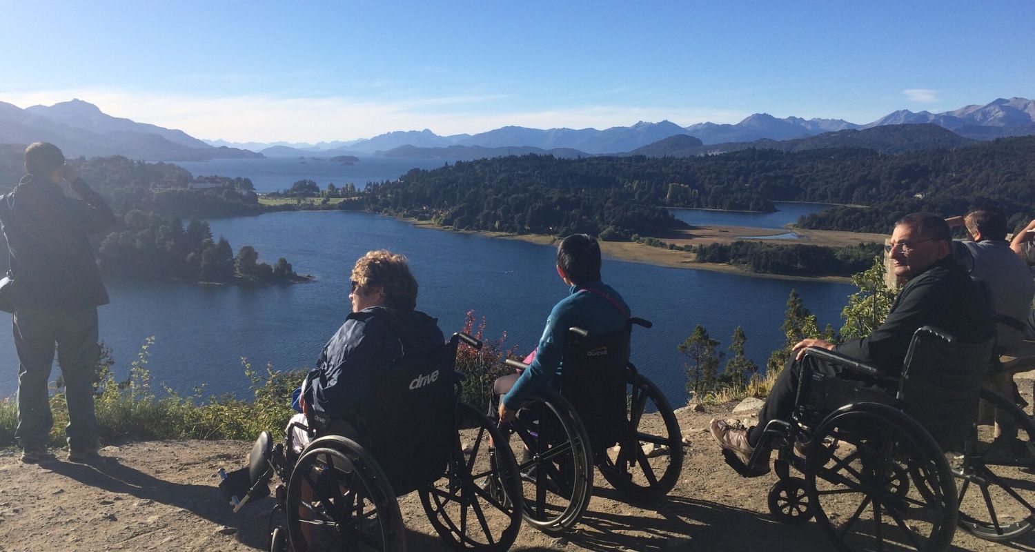 customer at viewpoint overlooking the vast ocean
