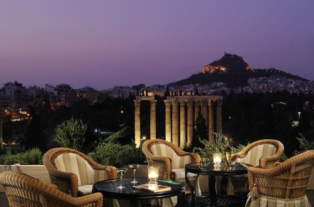 outdoor dining area at the hotel restaurant with views of ancient ruins