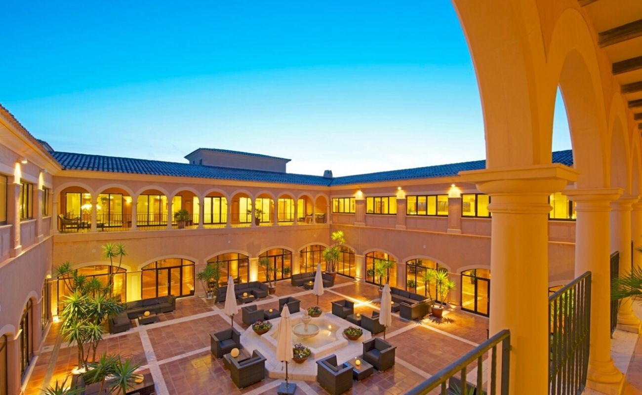 illuminated courtyard as the sun is going down