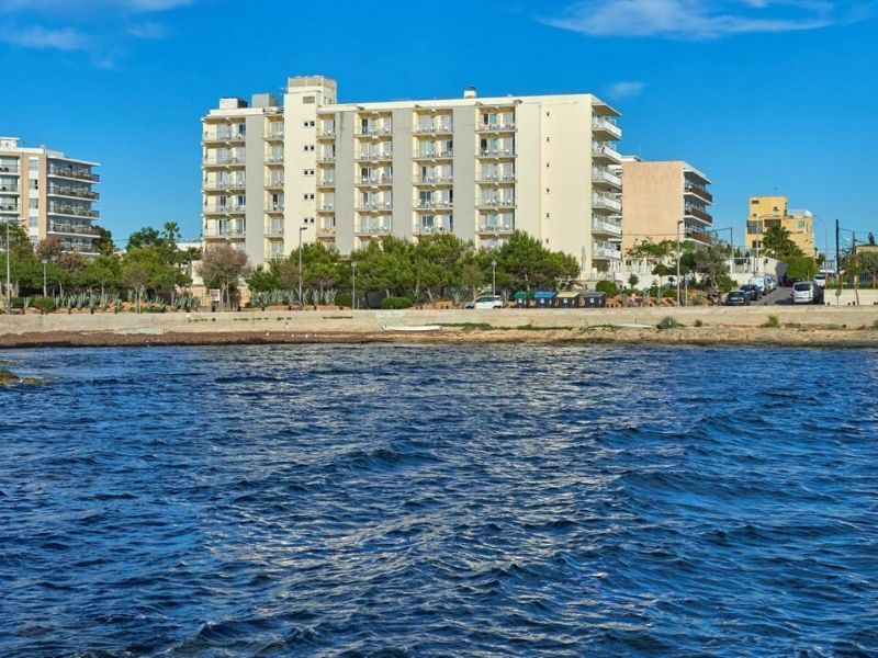 hotel exterior and the ocean