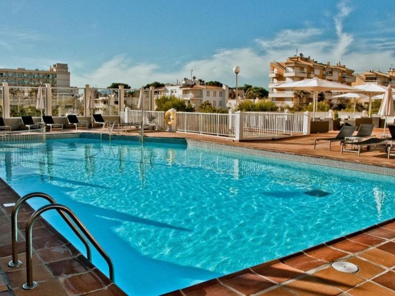 hotel exterior and outdoor swimming pool