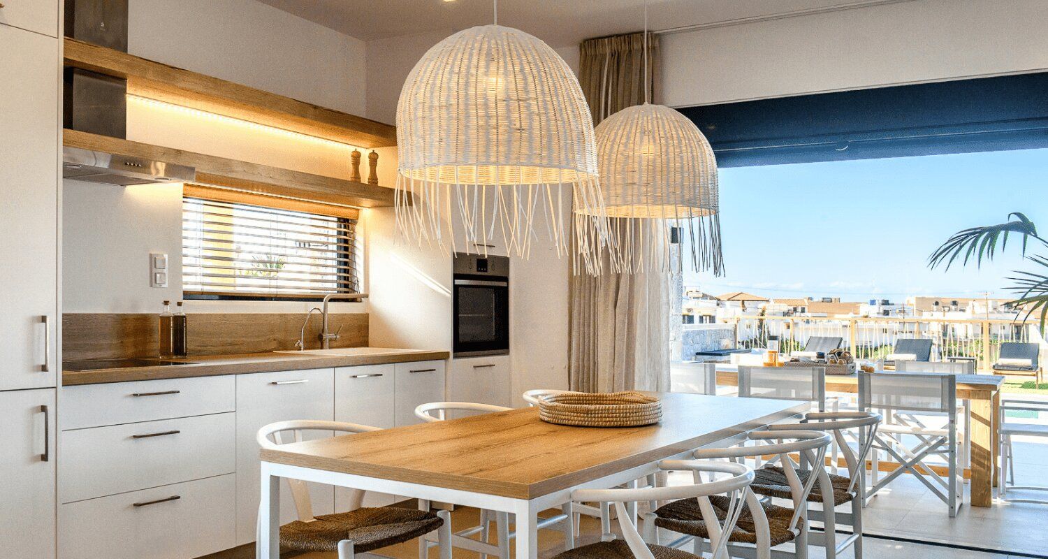 fully furnished kitchen with a view of the swimming pool