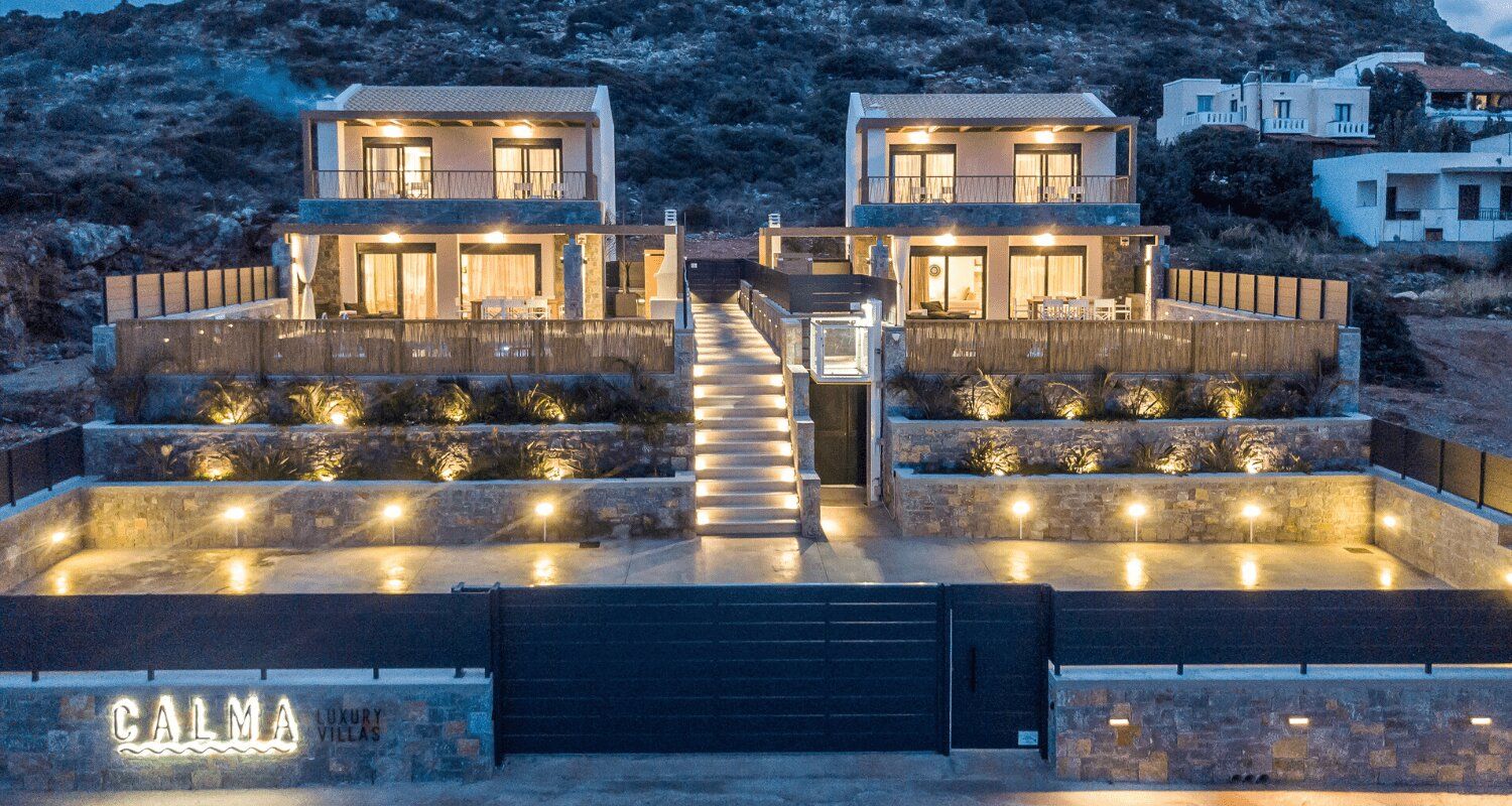 view of the exterior courtyard and villas showing the private parking