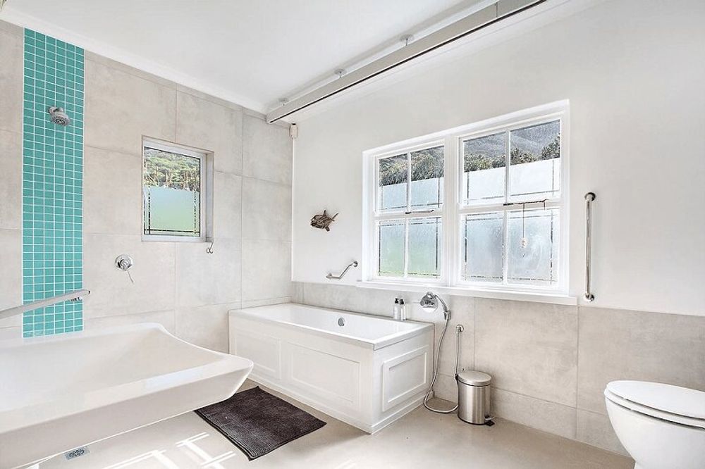 Example of a bath with grab rails at the Cape Town Villa (SA1) in Cape Town, South Africa