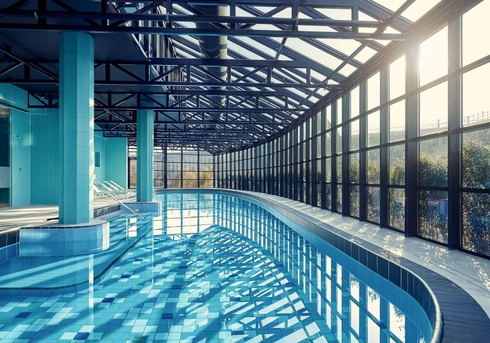 indoor swimming pool with a panoramic view