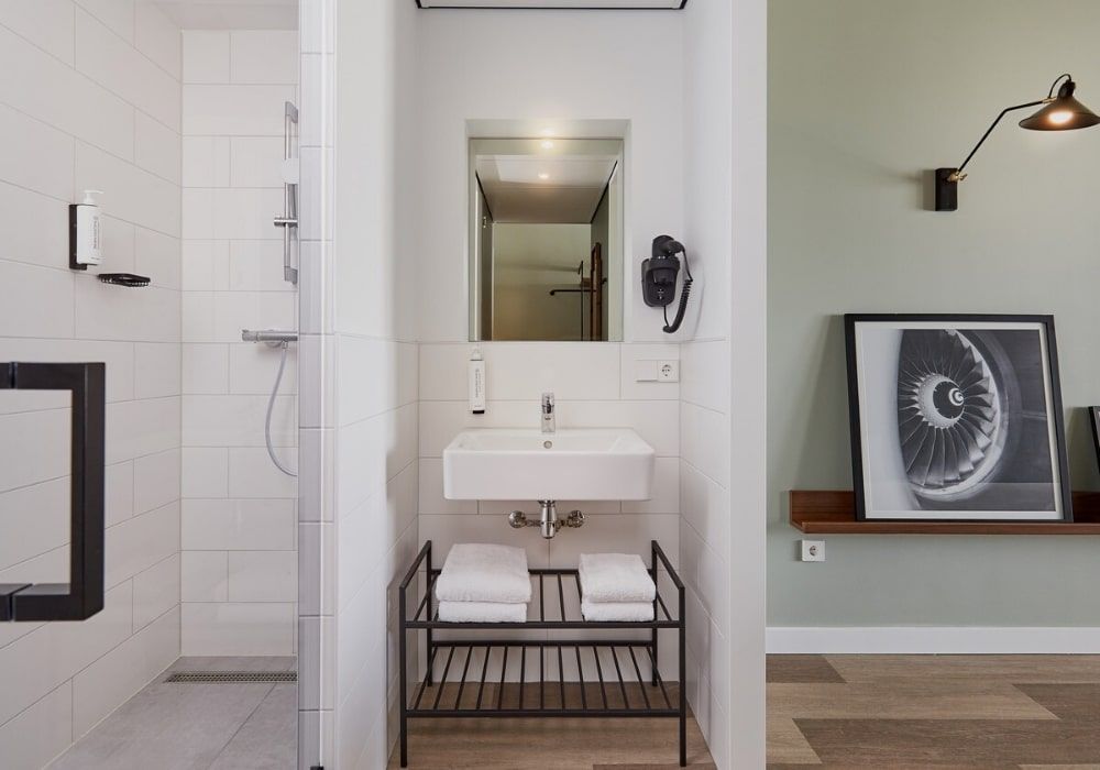 spacious bathroom with a wheel-in shower
