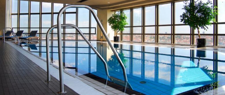 close up on the hand rails that lead into the pool
