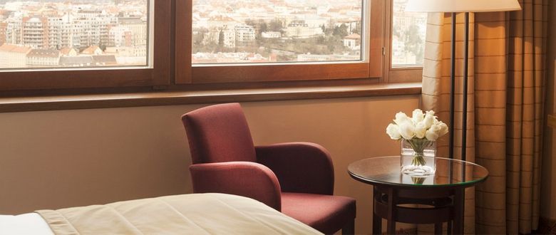 view of the city from a red lounge chair