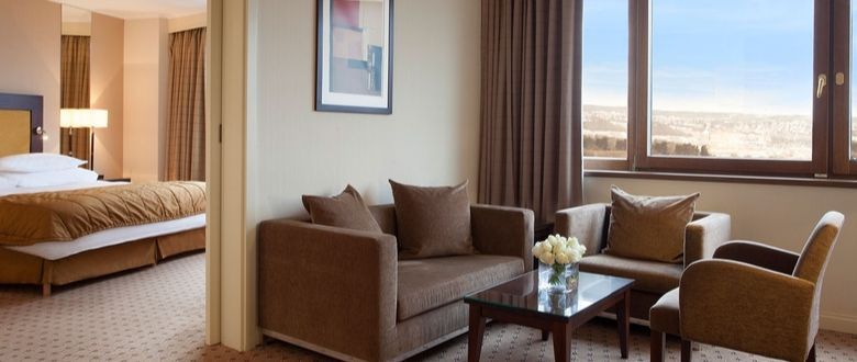 view of the bedroom and city from the living room