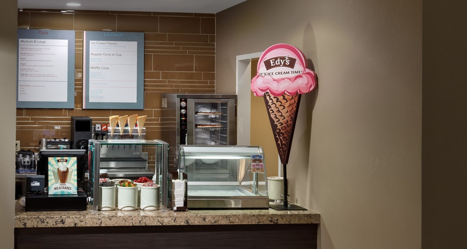 Ice cream shop with a strawberry sign