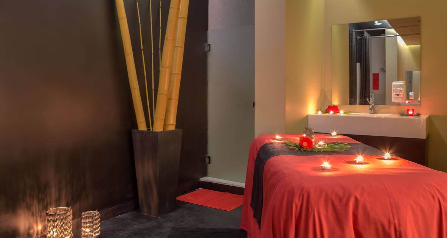 massage room filled with candles