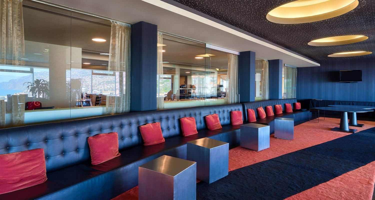 spacious indoor seating with red cushions