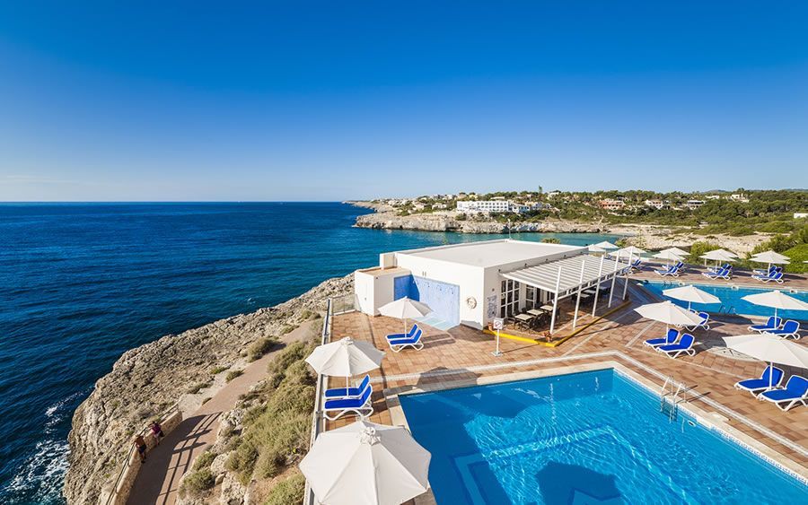aerial view of the outdoor swimming pool, observing the ocean and coastline