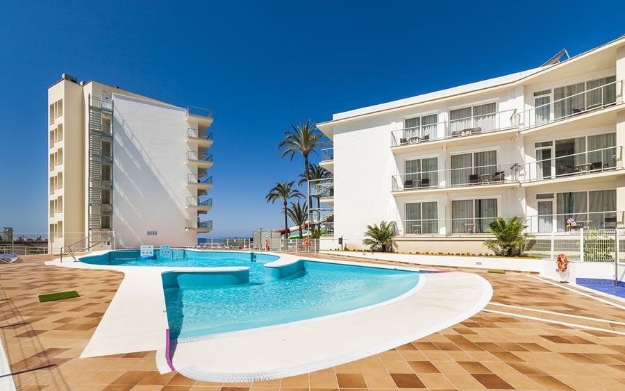 hotel exterior and outdoor swimming pool