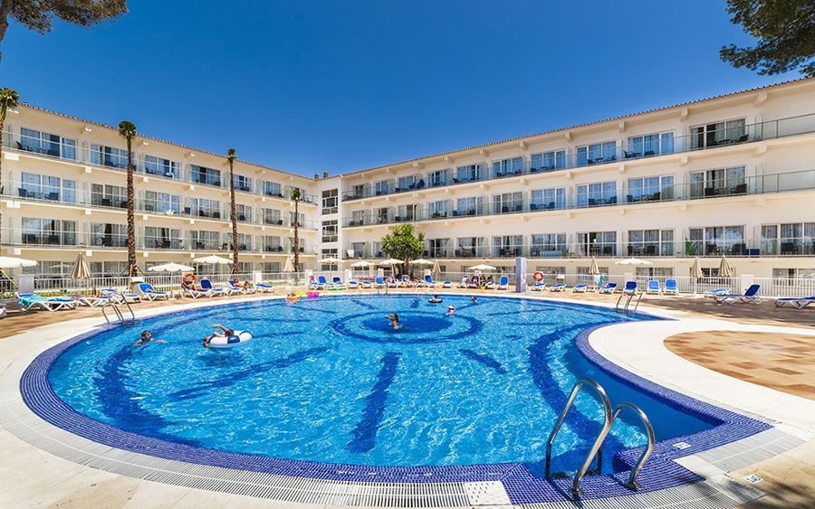 hotel exterior and outdoor swimming pool