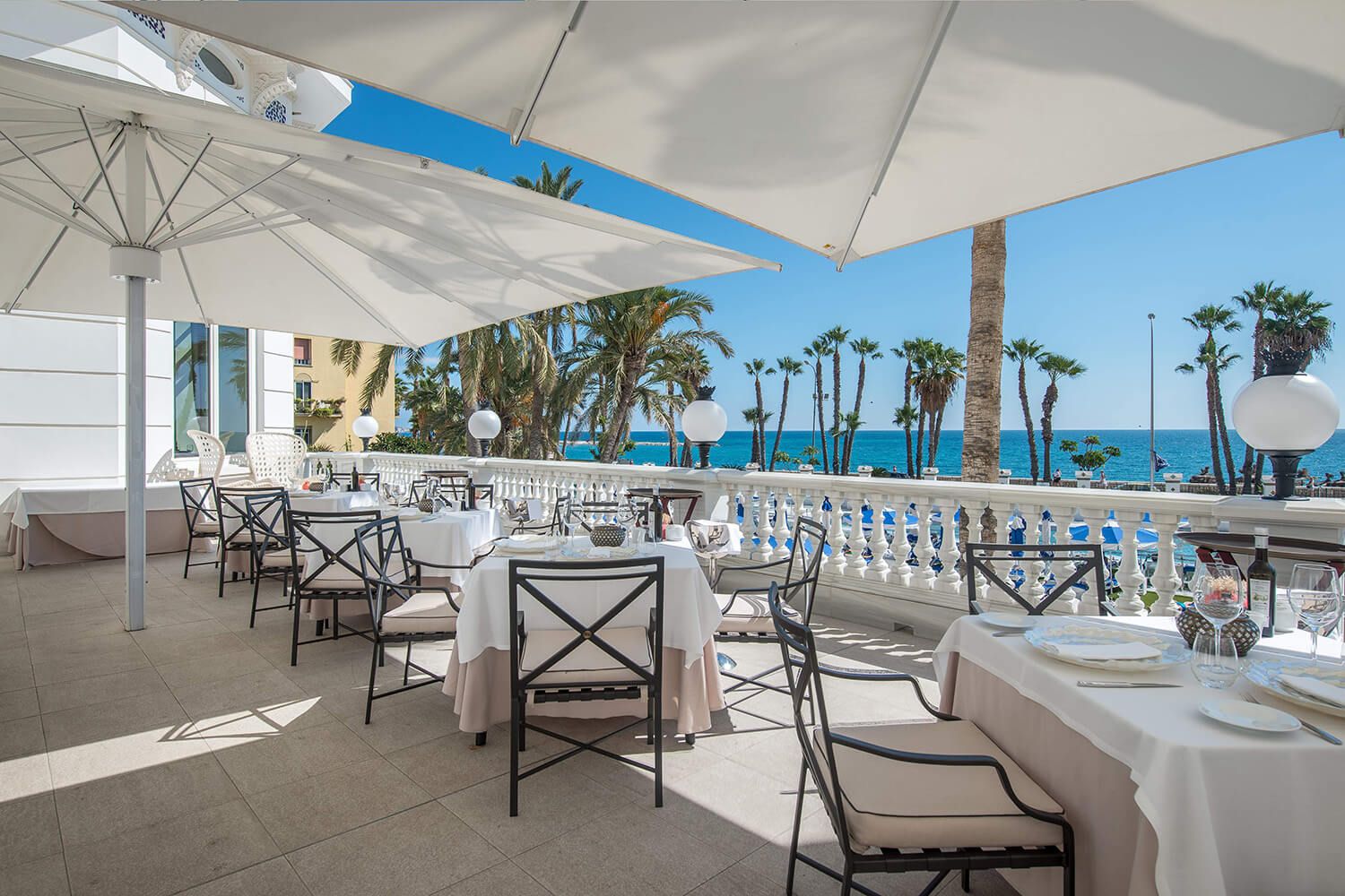 bright outdoor dining area near the pool