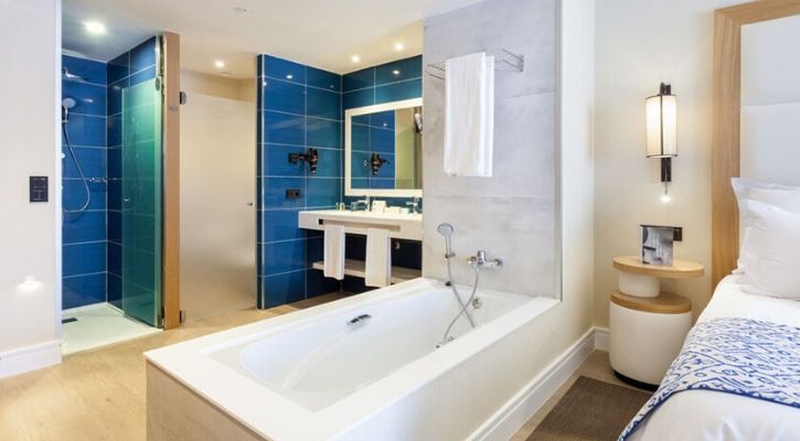 adapted bathroom with a wheel-in shower