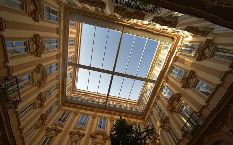 beautiful architecture inside the hotel with a skylight