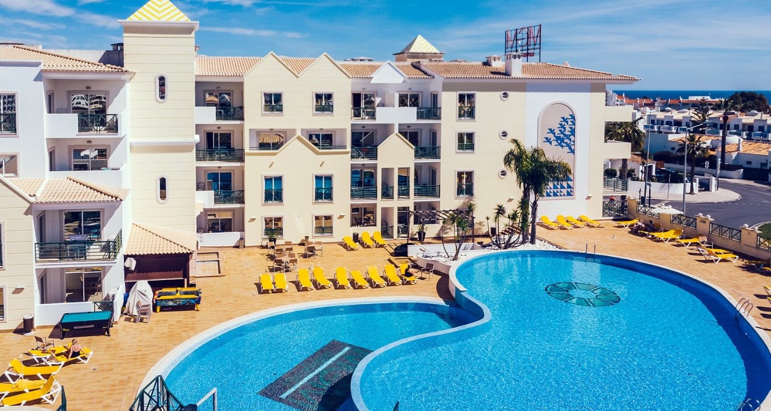 hotel exterior and outdoor swimming pool