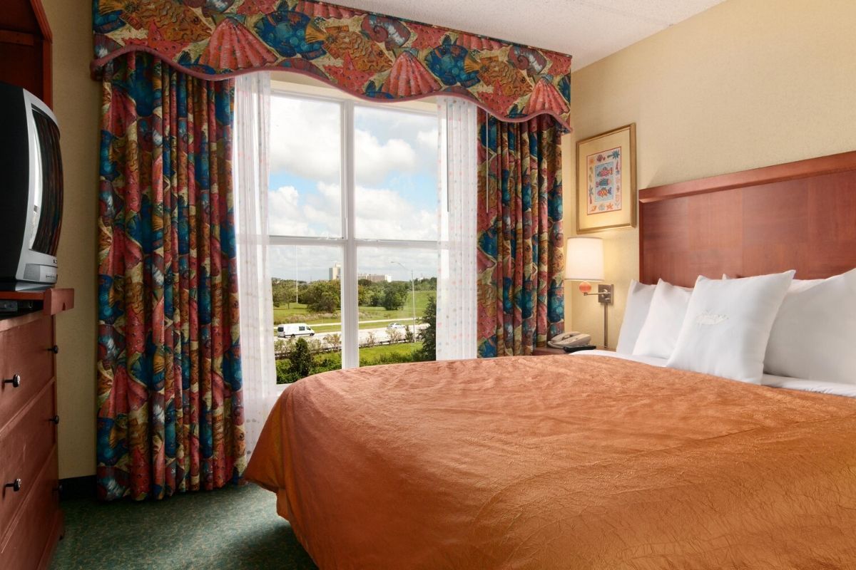 double bed with a view of a golf course