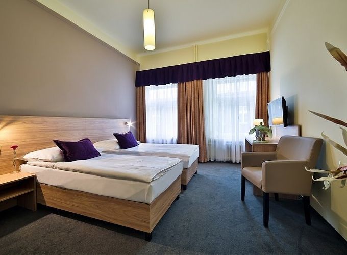 twin beds in a spacious bedroom