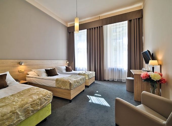 family room with three beds