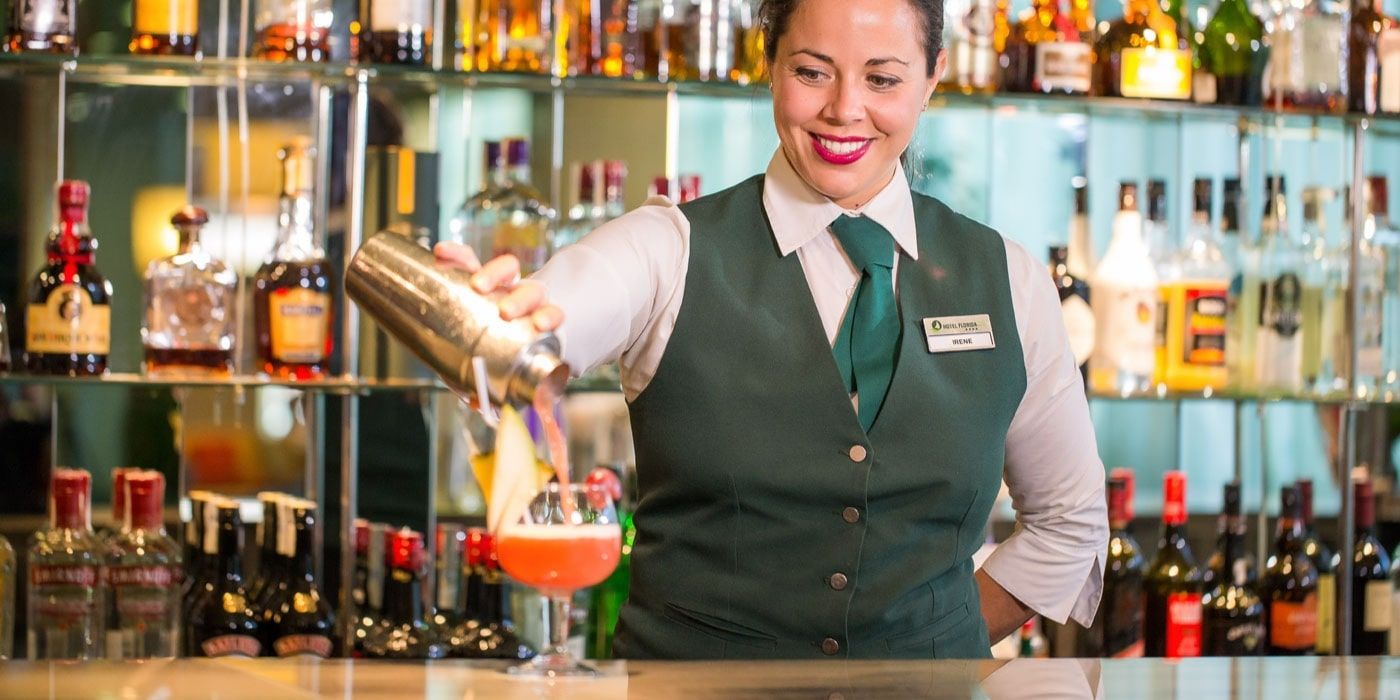 friendly hotel staff making cocktails