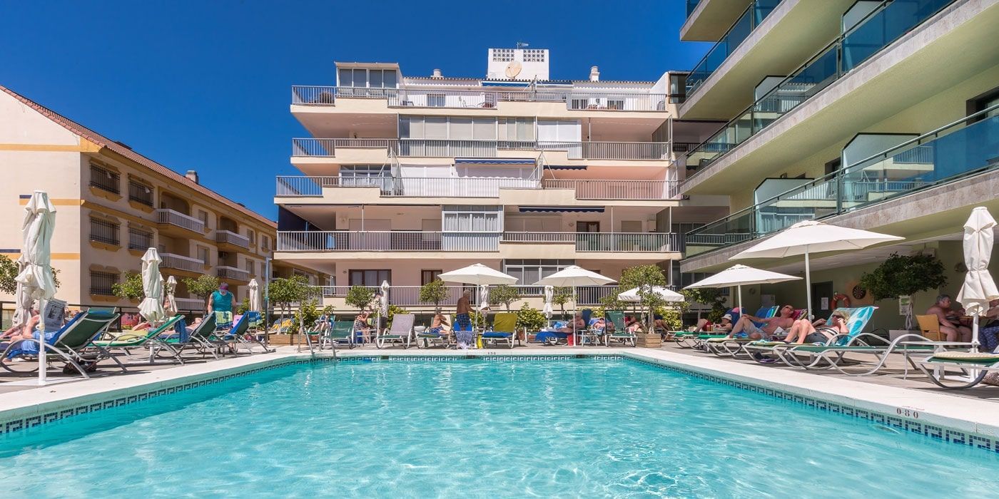 hotel exterior and outdoor swimming pool