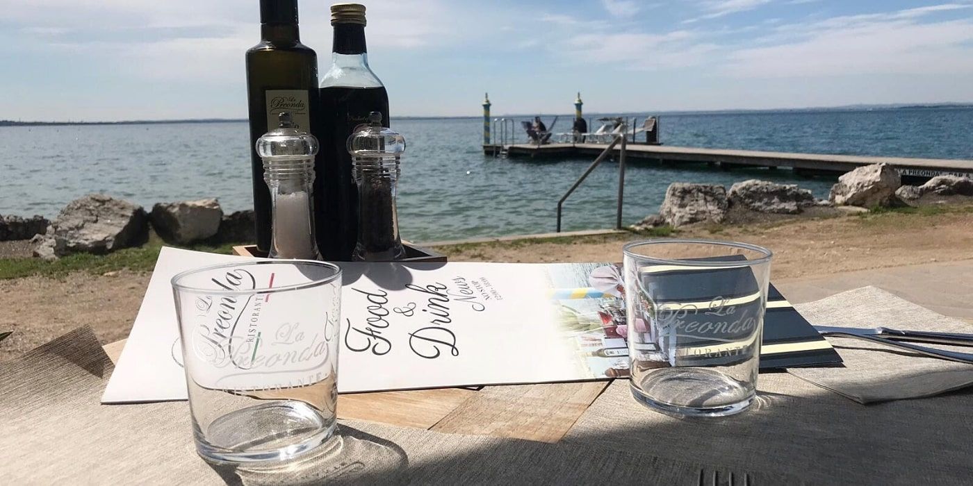 Relaxing with a drink at Hotel Kriss whilst soaking up the view of the Lake Garda