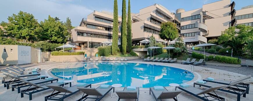 hotel exterior and outdoor swimming pool