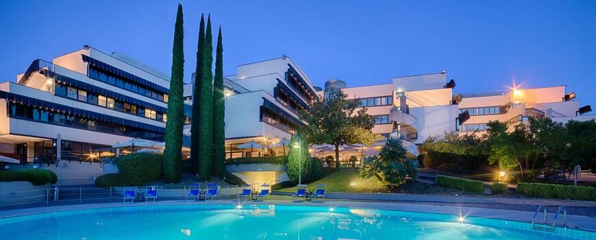 hotel exterior and outdoor swimming pool
