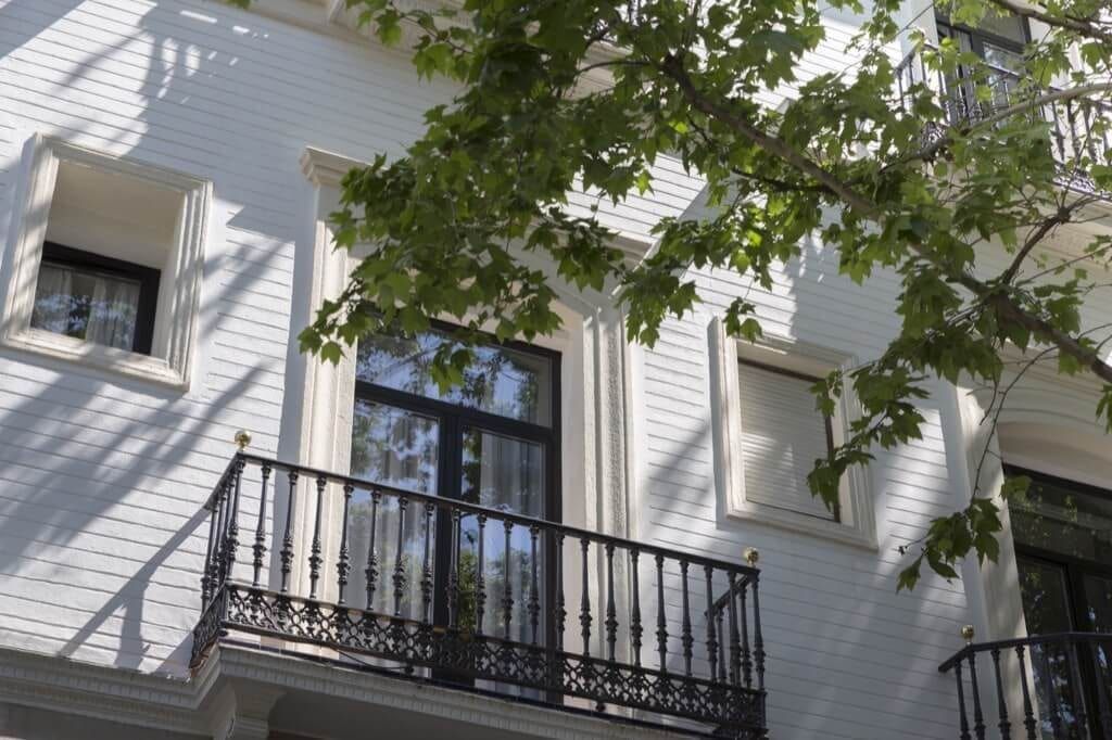 view of the hotel room balcony from the street