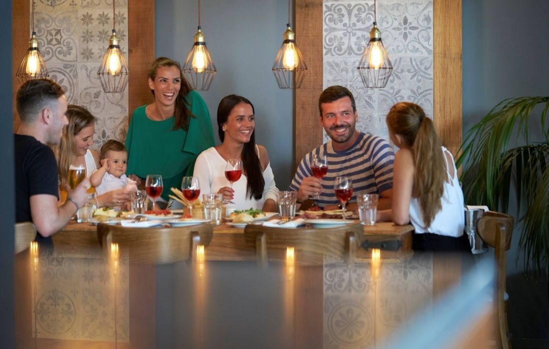 Family enjoying some food at the indoor restaurant