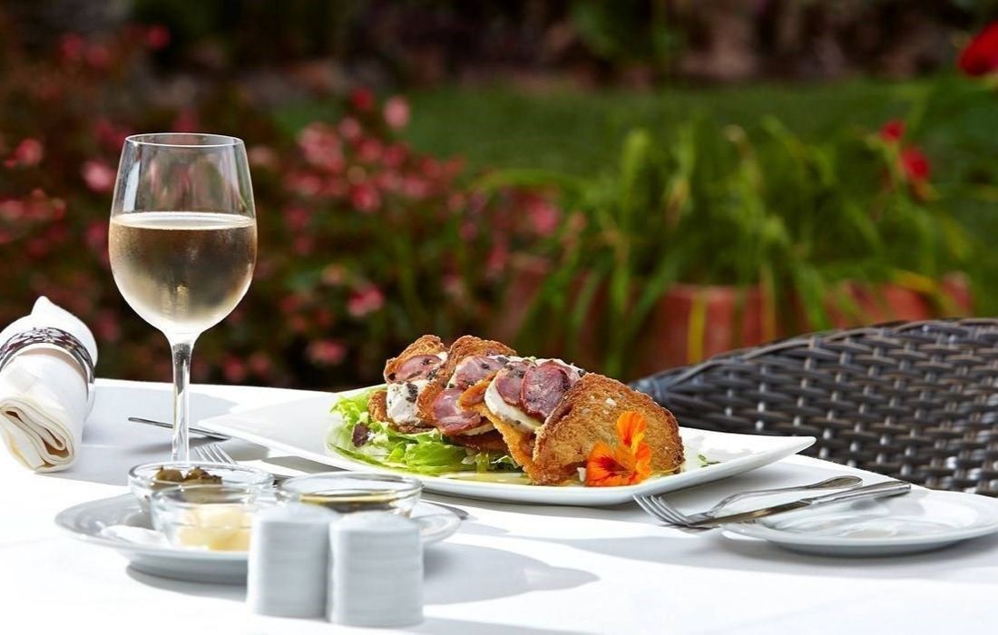 Outdoor dining at night, offering a romantic setting