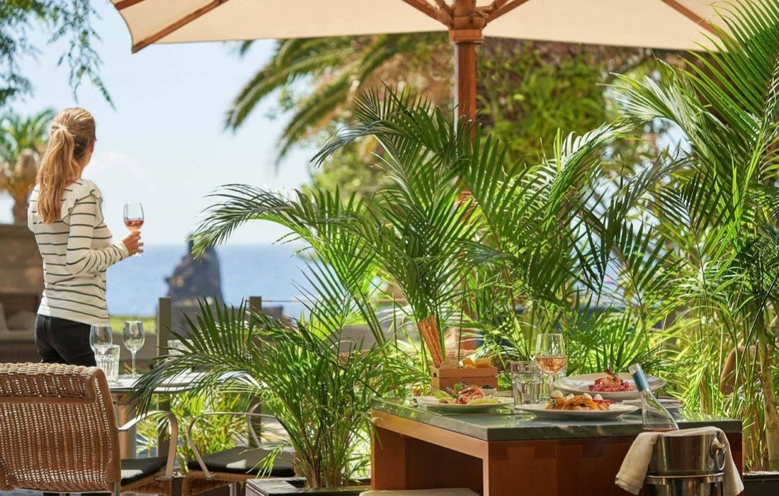 outdoor dining with an umbrella covering you from the sun
