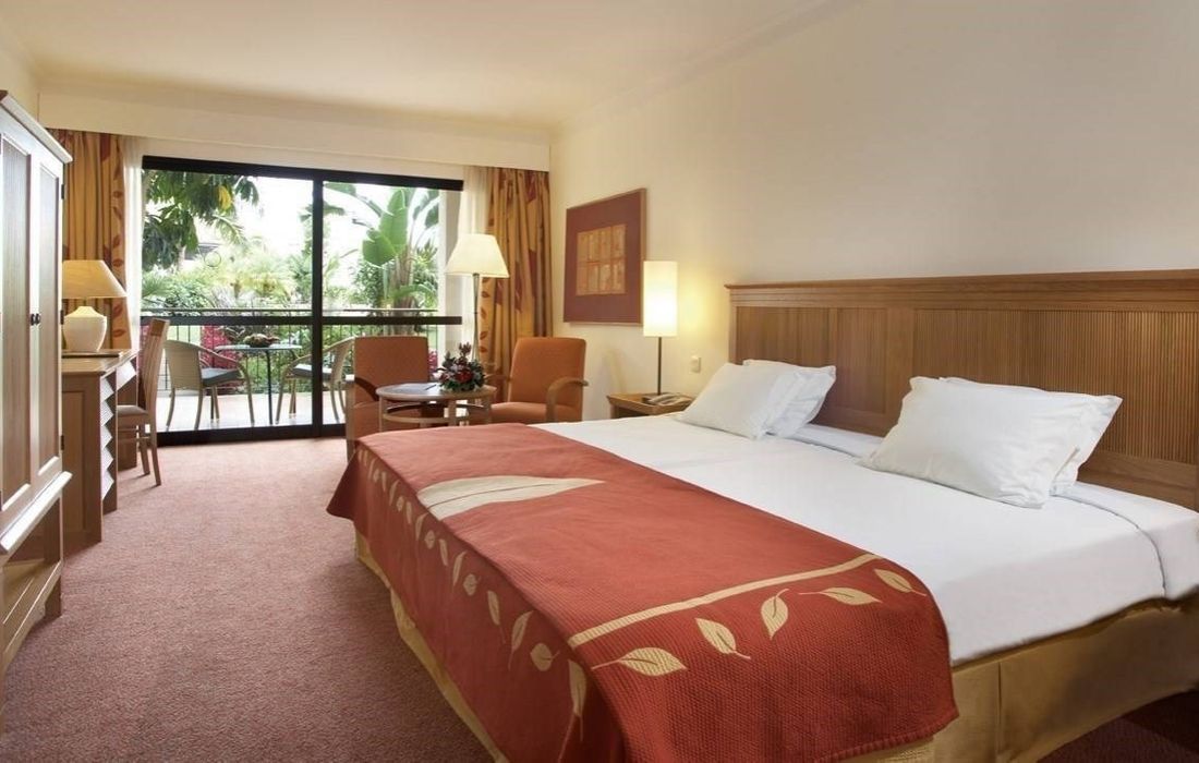 Spacious bedroom with a balcony terrace