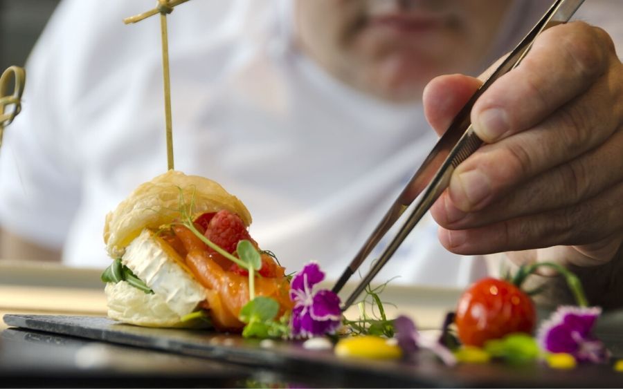 professional chef arranging a meal