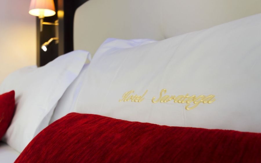 Hotel Saratoga embroidered on a pillow