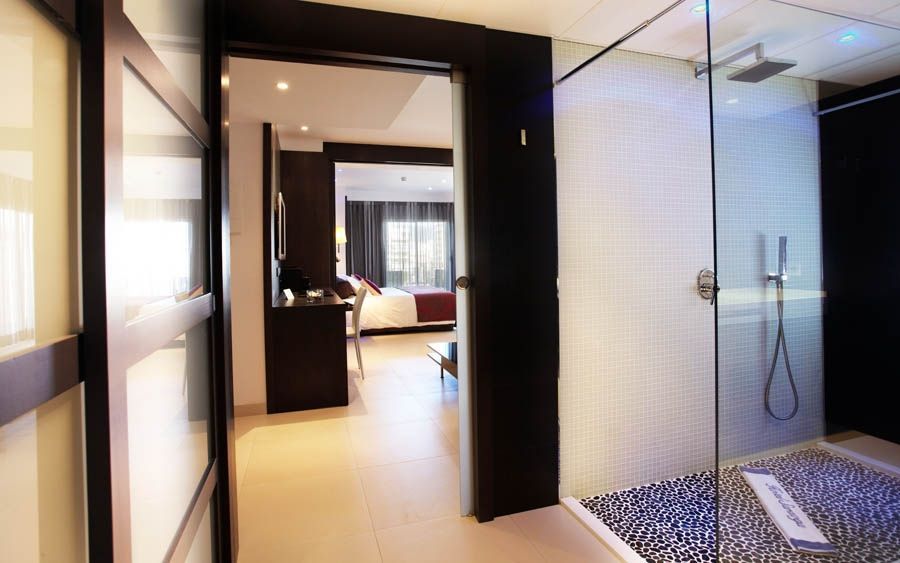 large bathroom with a wheel-in flat floor shower