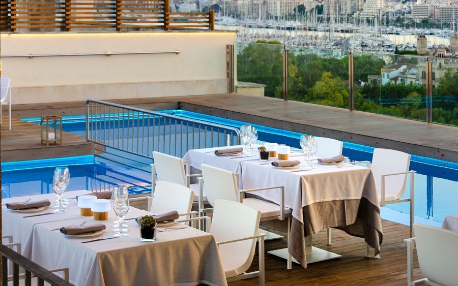 rooftop dining next to the swimming pool