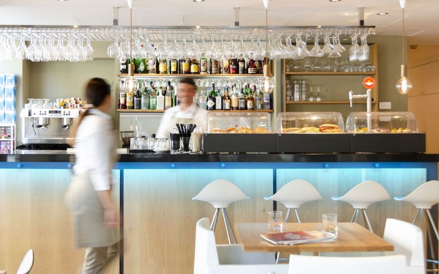 indoor sky bar with friendly hotel staff